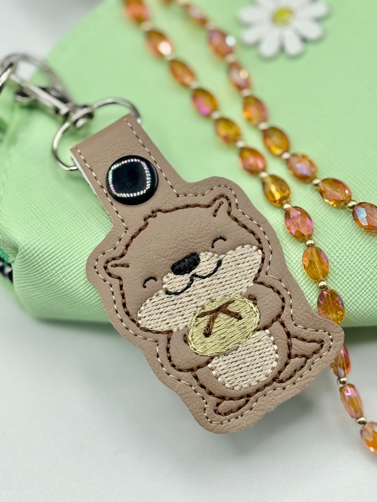 Cute Otter Holding Sourdough Keychain