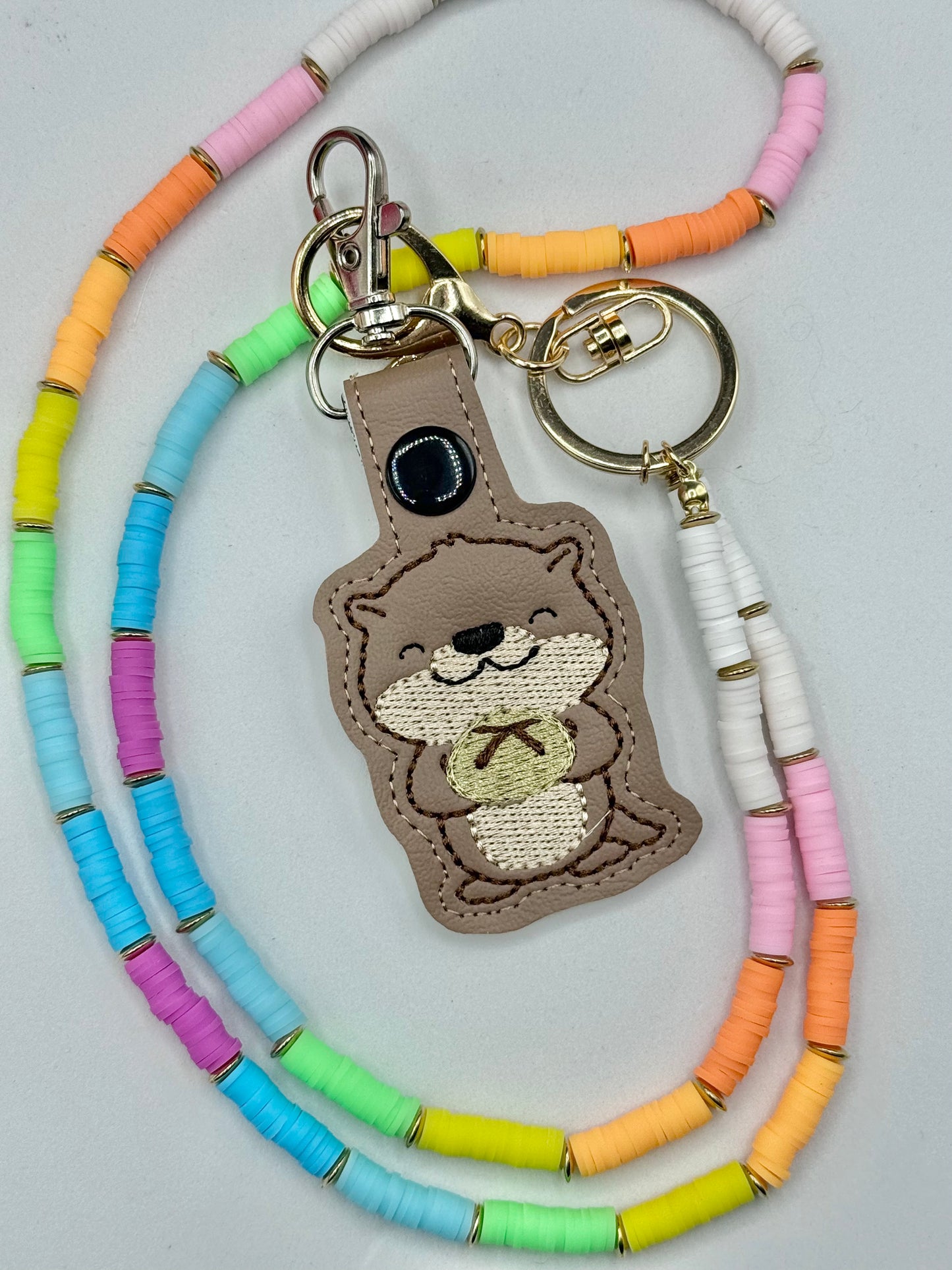 Cute Otter Holding Sourdough Keychain