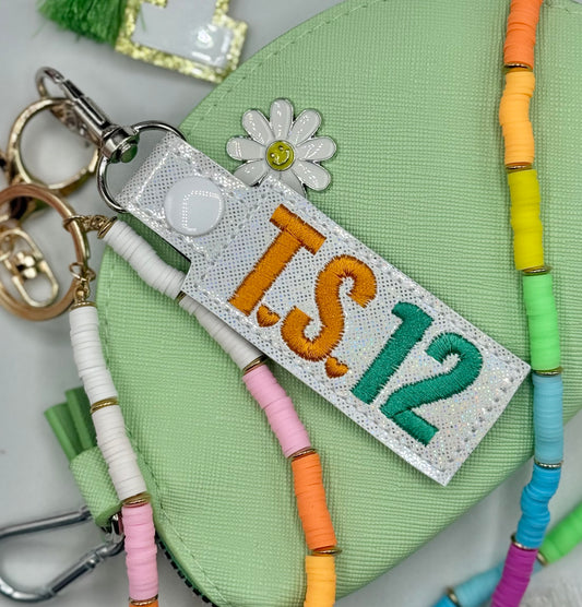 The Showgirl 12 keychain