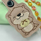 Cute Otter Holding Sourdough Keychain