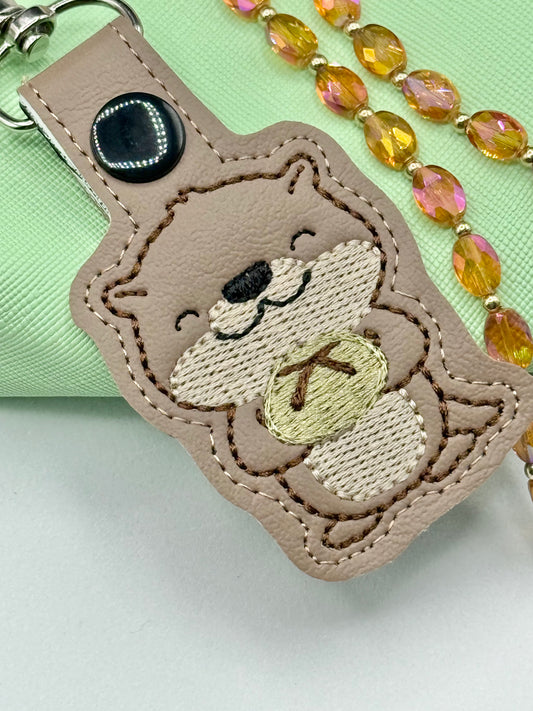 Cute Otter Holding Sourdough Keychain