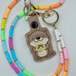 Cute Otter Holding Sourdough Keychain