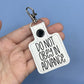 Do Not Obey in advance keychain